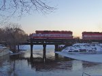 WSOR 4076 leads the JH over Cravath Lake at sunset